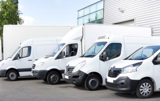 Various delivery vehicles parked in a row | Featured image for The 2020 Guide to the Instant Asset Write Off.
